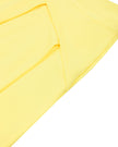 Side angle view of the CourtClub A-Line Skirt in Yellow highlighting its flowing silhouette.