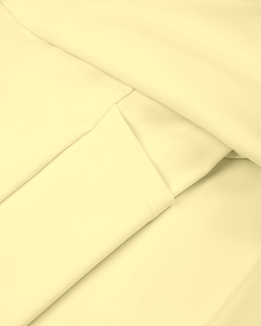 Close-up showing the built-in pockets inside the CourtClub Color Block A-Line Skirt in Light Yellow