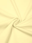 Detailed view of the lightweight performance fabric on the CourtClub Color Block A-Line Skirt in Light Yellow