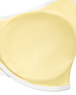 Close-up of the removable chest padding inside the CourtClub Color Block Halter Sports Bra in Light Yellow