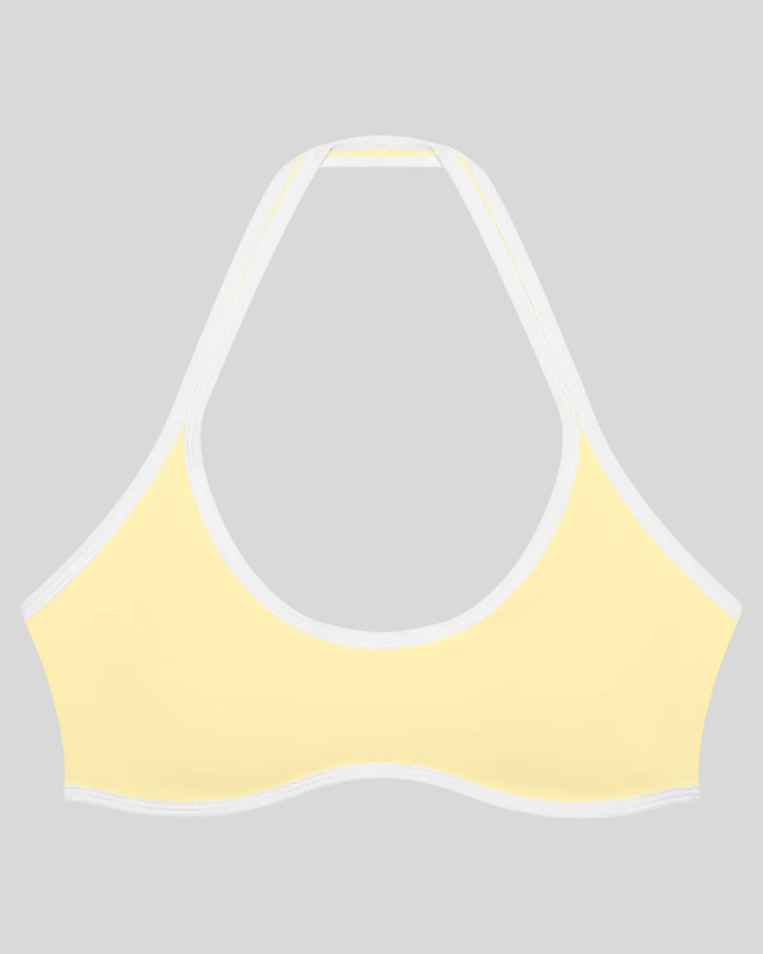 CourtClub Color Block Halter Sports Bra in Light Yellow front view featuring contrast trim and a flattering halter neckline