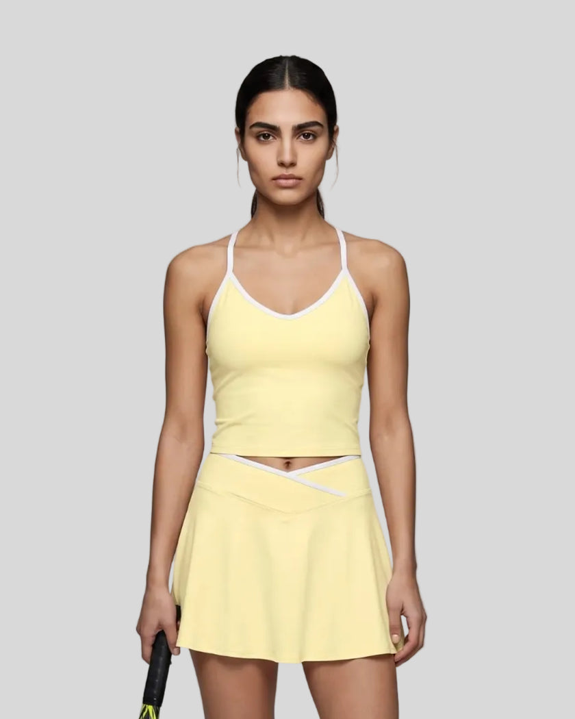 Model wearing the CourtClub Color Block Tank Top in LIght Yellow, front view