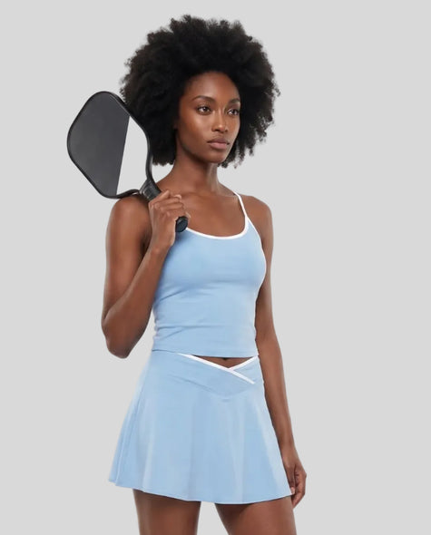 Model wearing the CourtClub Color Block Tank Top in Sky Blue, front view