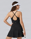 Woman wearing CourtClub Crossback Dress in Black, mid-body back view highlighting the fitted bodice