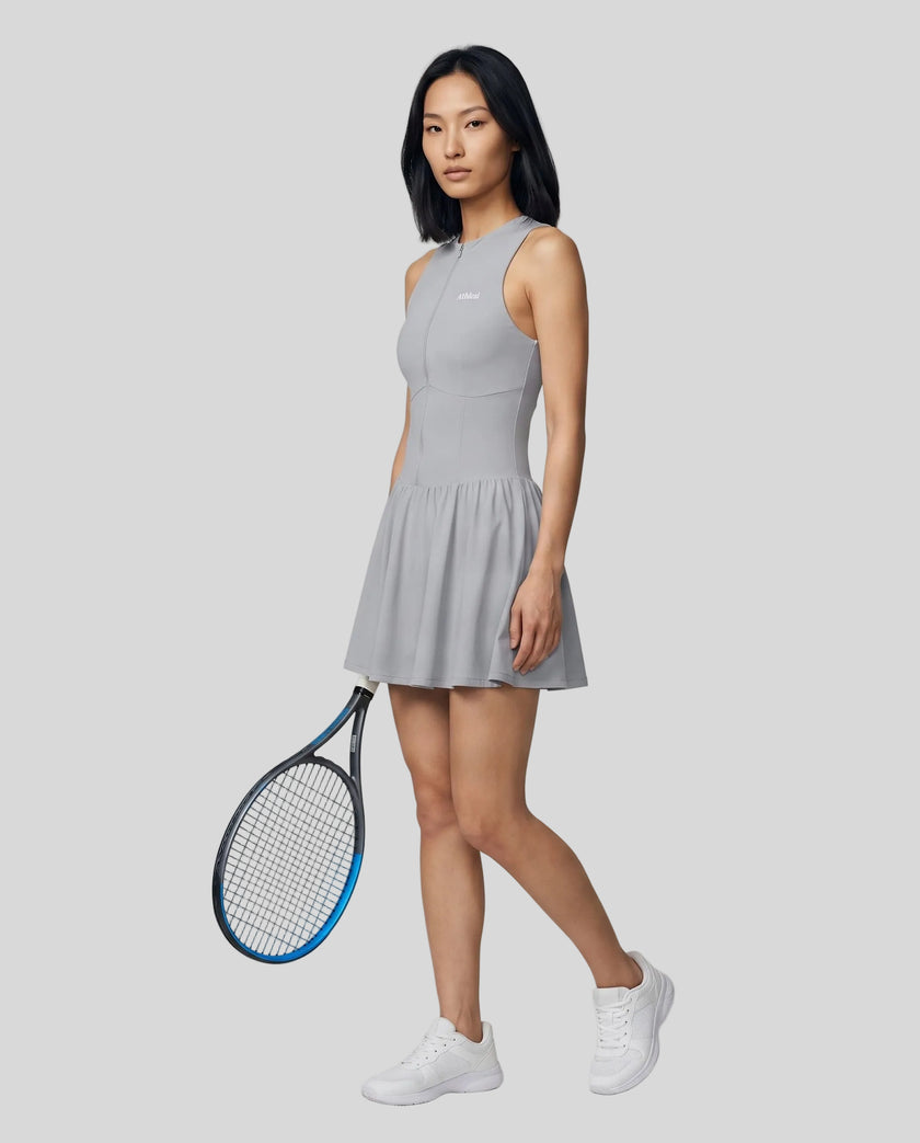 Woman wearing the Athlesi CourtClub Full-Zip Dress in Gray, full-body front view styled for court and club.