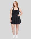 Woman wearing Athlesi CourtClub Open-Back Tennis Dress in Black full-body front view