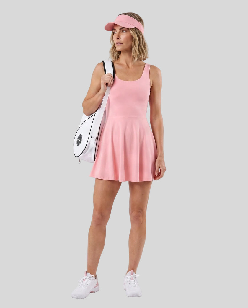 Woman wearing Athlesi CourtClub Open-Back Tennis Dress in Pink full-body front view