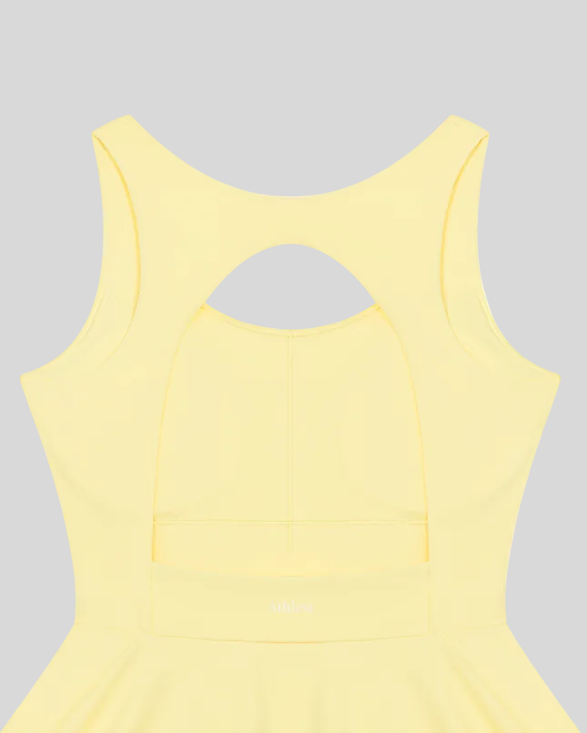 Athlesi CourtClub Open-Back Tennis Dress in Yellow back view of back design with Athlesi logo on waist.