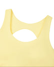 Athlesi CourtClub Open-Back Tennis Dress in Yellow closeup of scoop neckline and fitted bodice