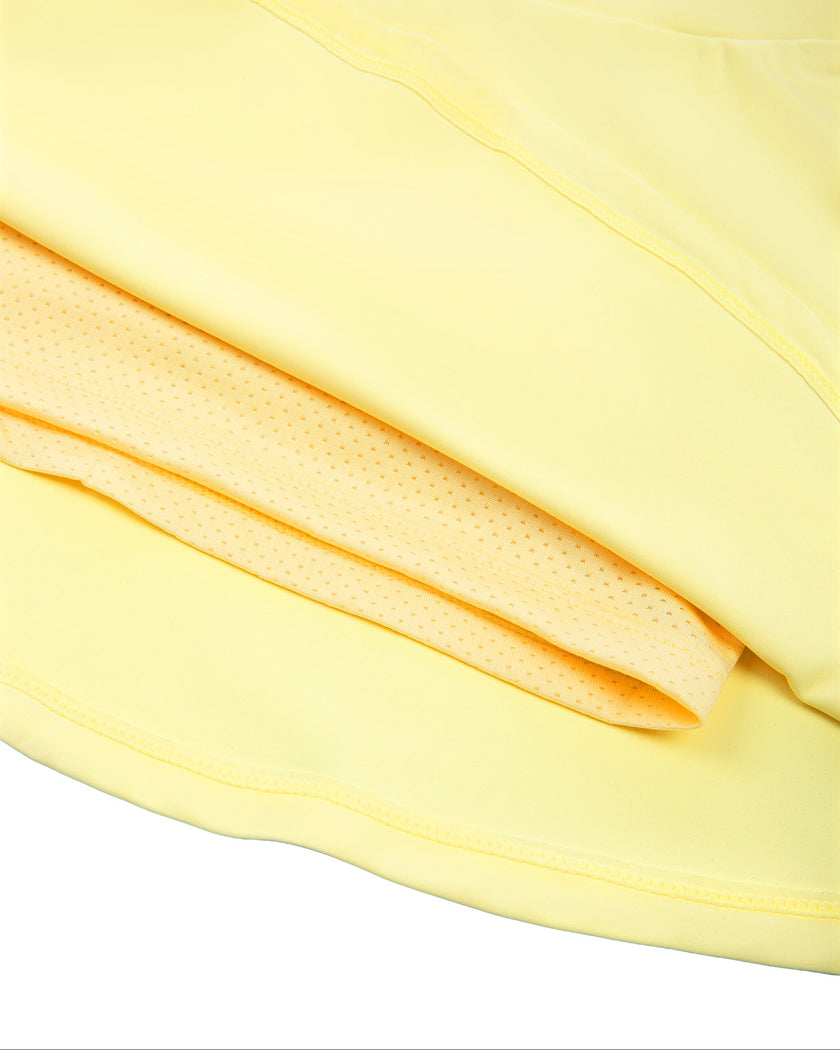 Close-up of the built-in shorts inside the CourtClub Pleated Skirt in Yellow
