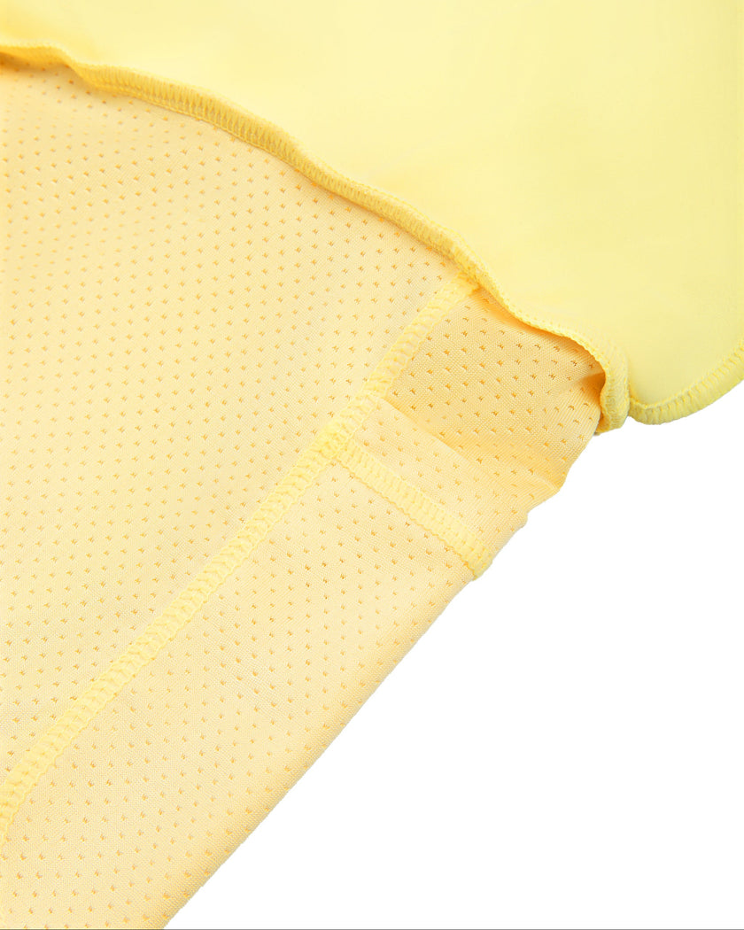 Interior close-up of the built-in shorts inside the CourtClub Pleated Skirt in Yellow.