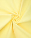 Detailed view of the fabric texture on the CourtClub Pleated Skirt in Yellow