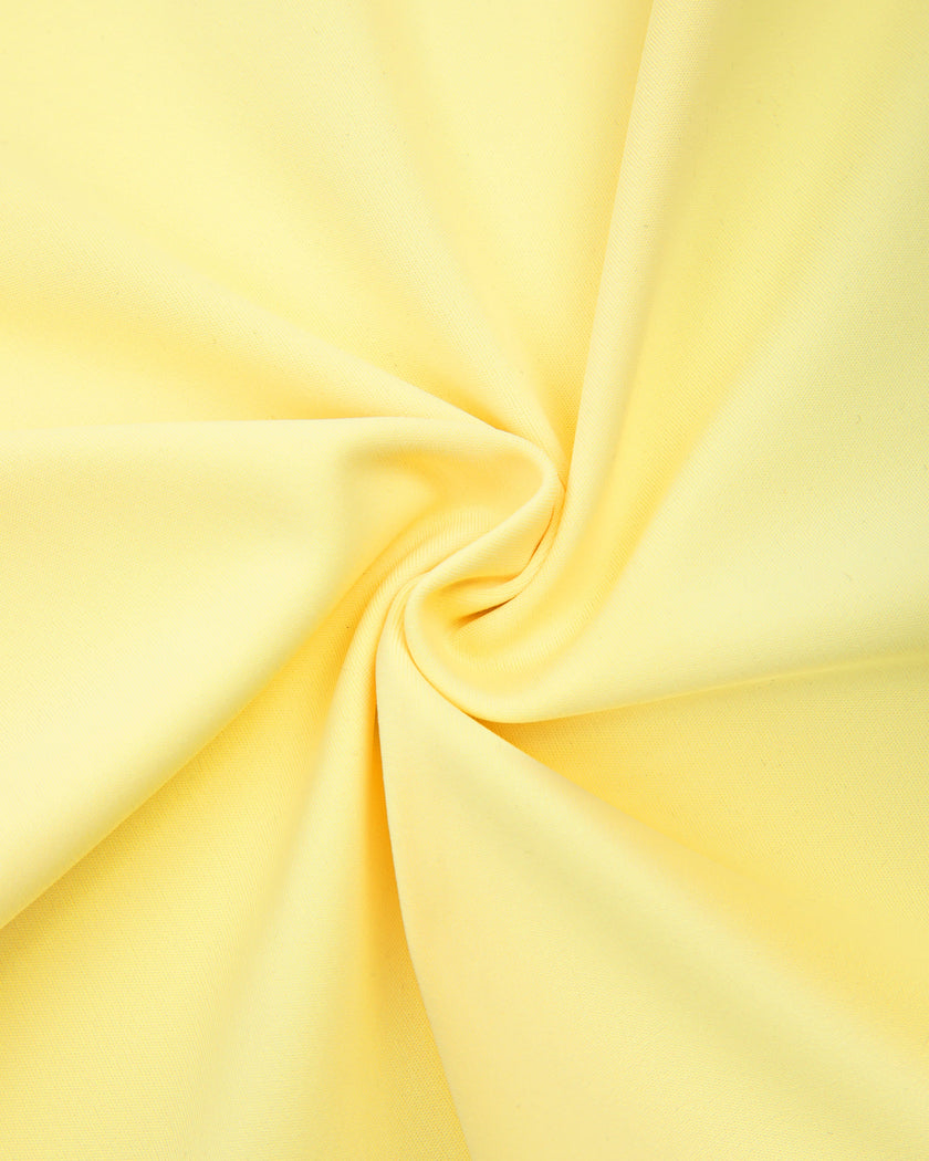 Detailed view of the fabric texture on the CourtClub Pleated Skirt in Yellow