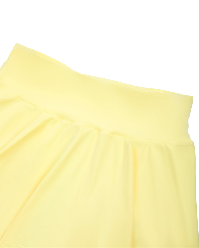 Back waistband detail of the CourtClub Pleated Skirt in Yellow