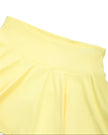 Close-up of the high-rise waistband on the CourtClub Pleated Skirt in Yellow