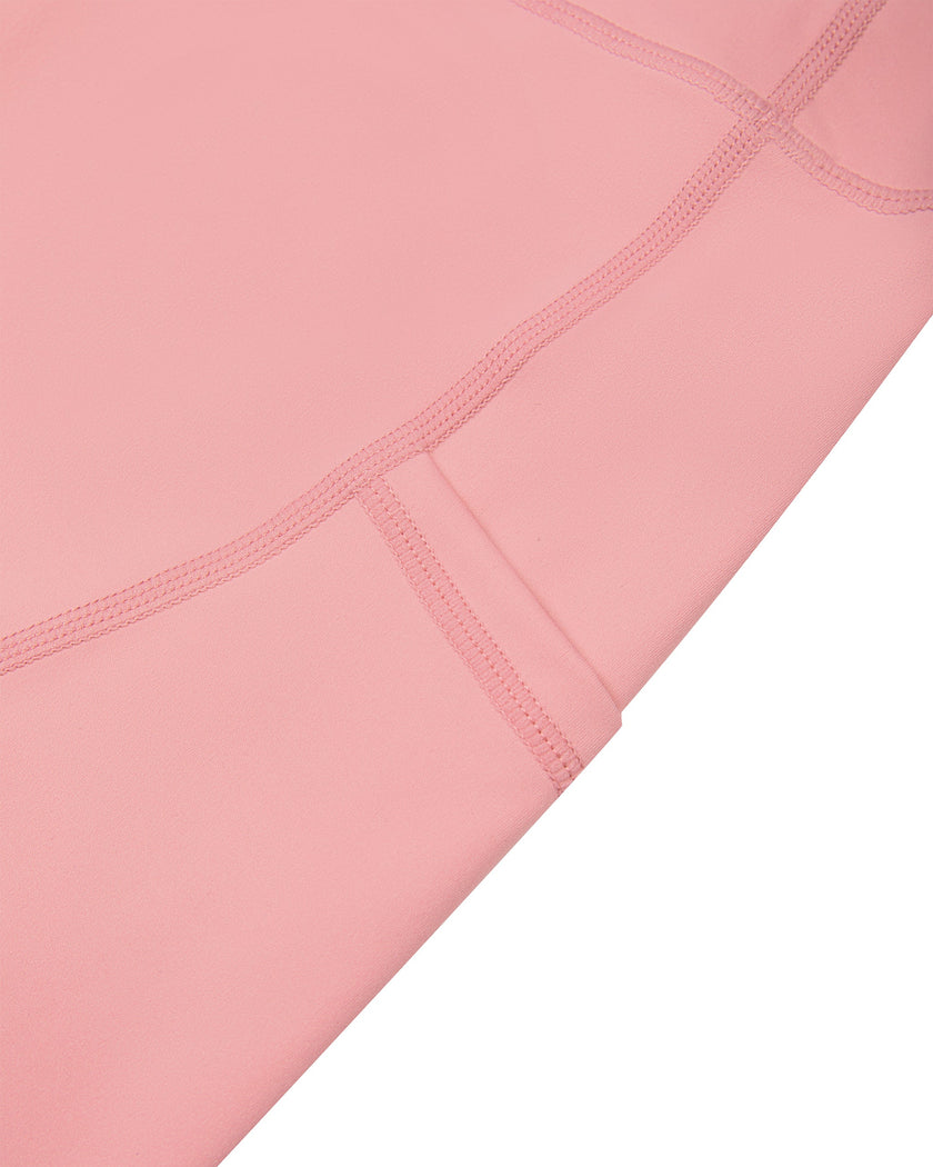 Athlesi CourtClub Tennis Short in Pink closeup showing fitted side pocket and seam construction
