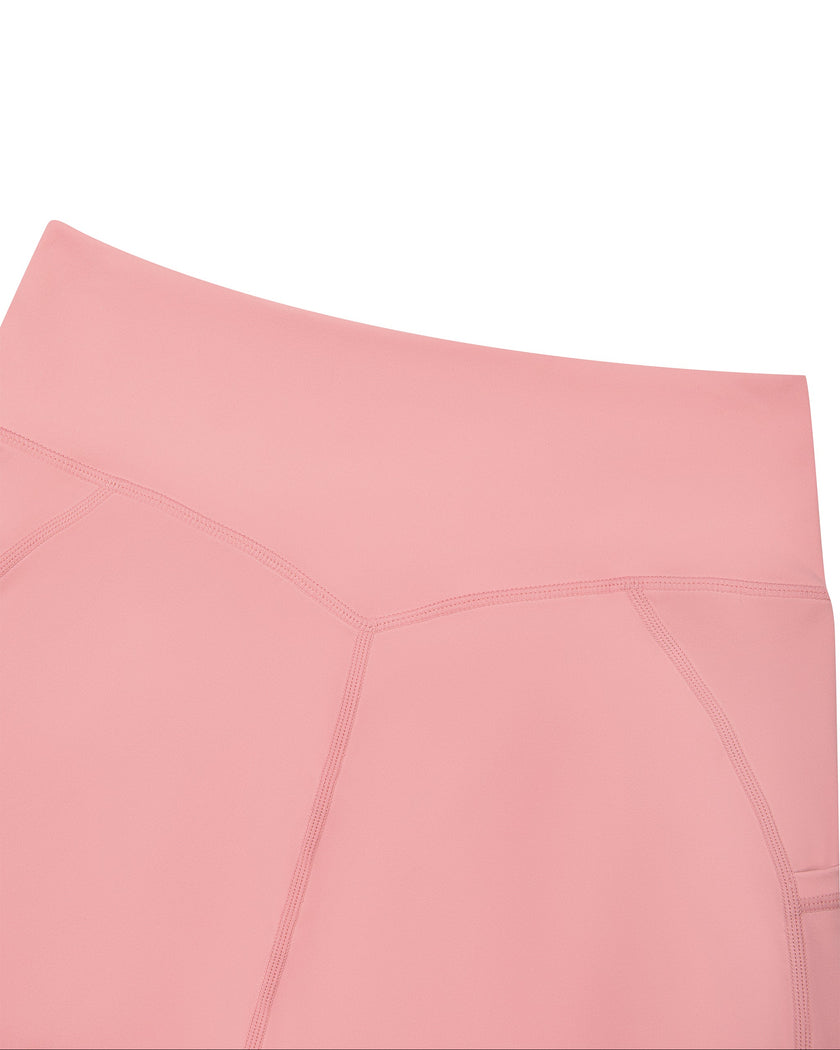 Athlesi CourtClub Tennis Short in Pink closeup of high-rise back waistband and V-shaped seam