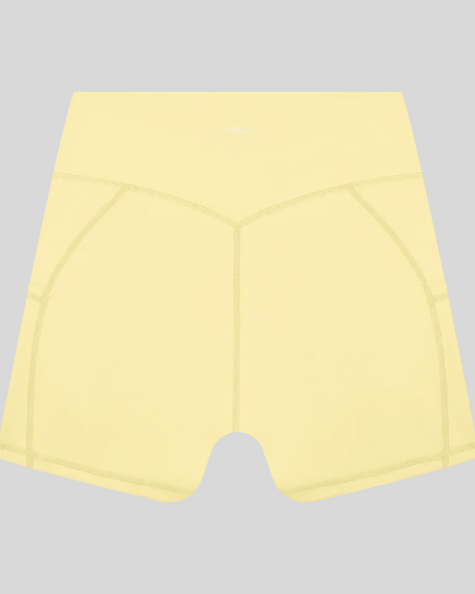 Athlesi CourtClub Tennis Short in Yellow back view with sculpted waistband seam