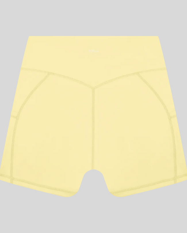 Athlesi CourtClub Tennis Short in Yellow back view with sculpted waistband seam