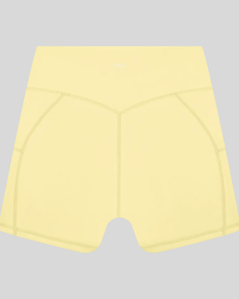 Athlesi CourtClub Tennis Short in Yellow back view with sculpted waistband seam