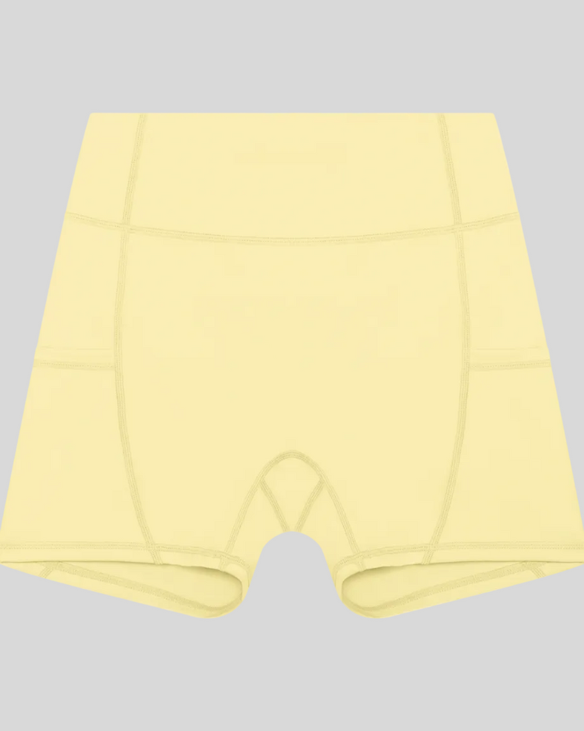 Athlesi CourtClub Tennis Short in Yellow front view with high-rise waistband and fitted silhouette