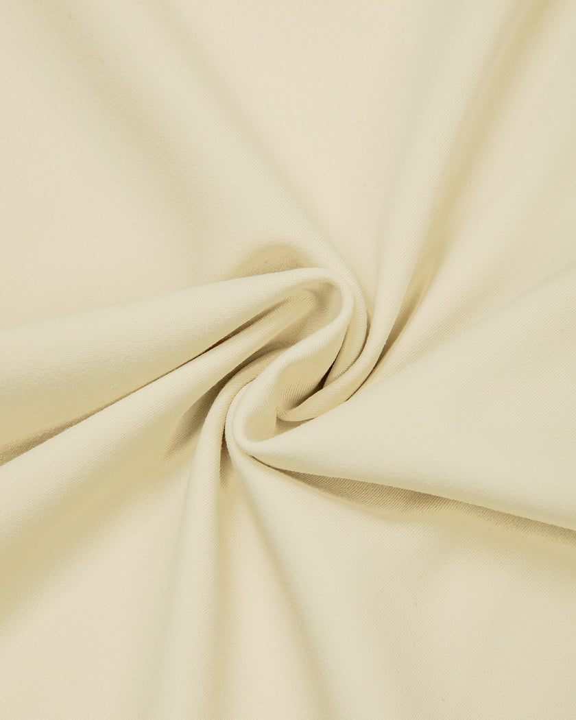Detailed view of the flexible nylon-blend fabric on the Athlesi CourtClub Tie-Front Dress in Light Apricot.