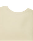 Close-up of the front round neckline on the Athlesi CourtClub Tie-Front Dress in Light Apricot.