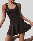 CourtFlow Active Dress in black with V-neck silhouette and wide straps, front view