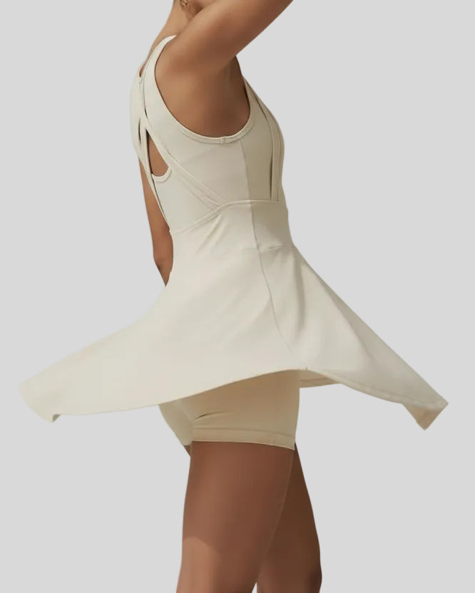 Back view of the CourtFlow Active Dress in cream showing wide straps and built-in liner