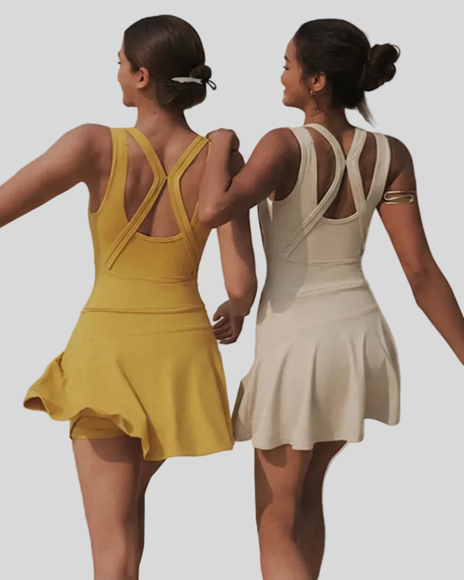 Two women wearing yellow and beige tennis dresses against a plain background