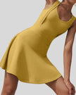 CourtFlow Active Dress in mustard with V-neck silhouette and wide straps, front view