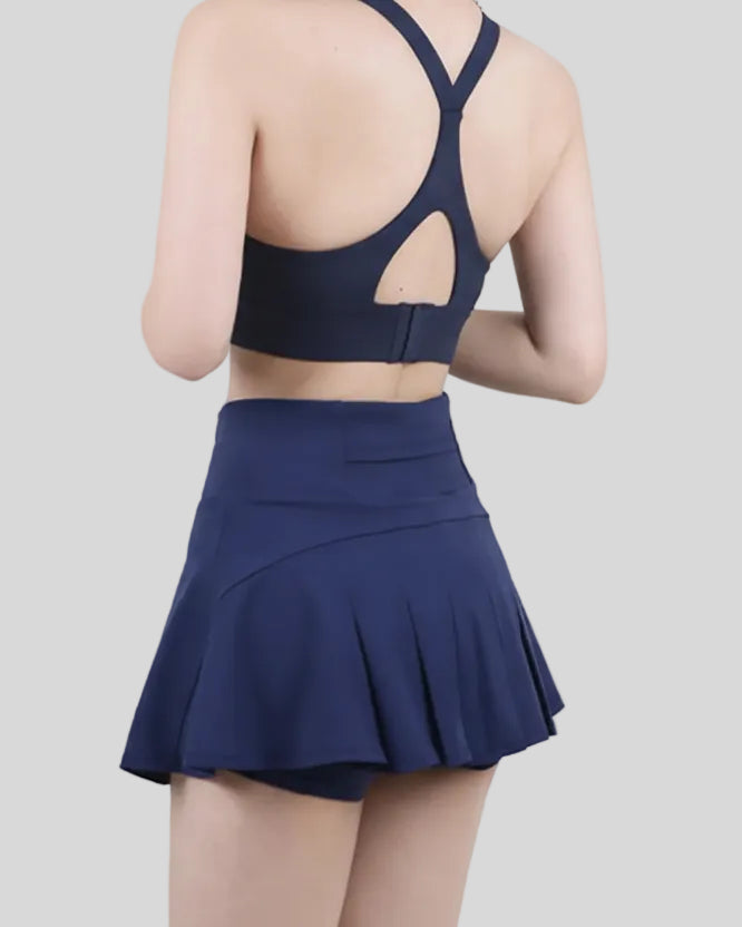CourtFlow Pleated Athletic Skirt in dark blue - Athlesi