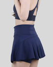 Dark blue performance skort featuring sporty performance fabric -Athlesi