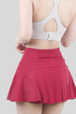 CourtFlow Pleated Athletic Skirt in hot pink - Athlesi