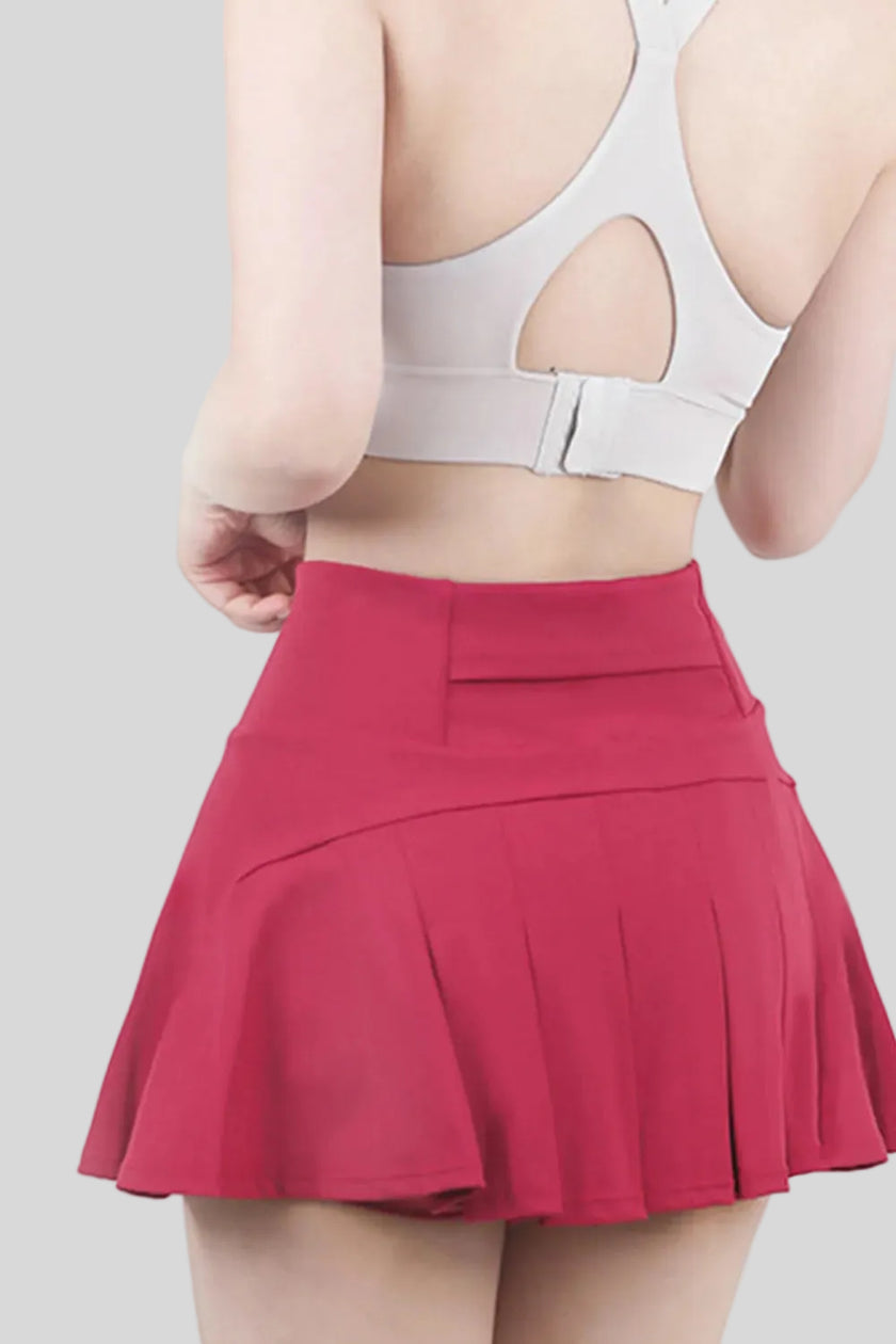 CourtFlow Pleated Athletic Skirt in hot pink - Athlesi