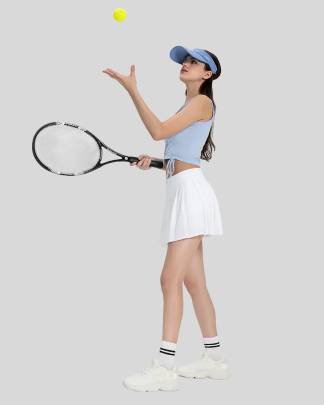 Full body left side view of Athlesi CourtLine Active Skirt with subtle pleated detail