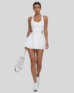 Wide-strap active dress with built-in liner shown from the front in white