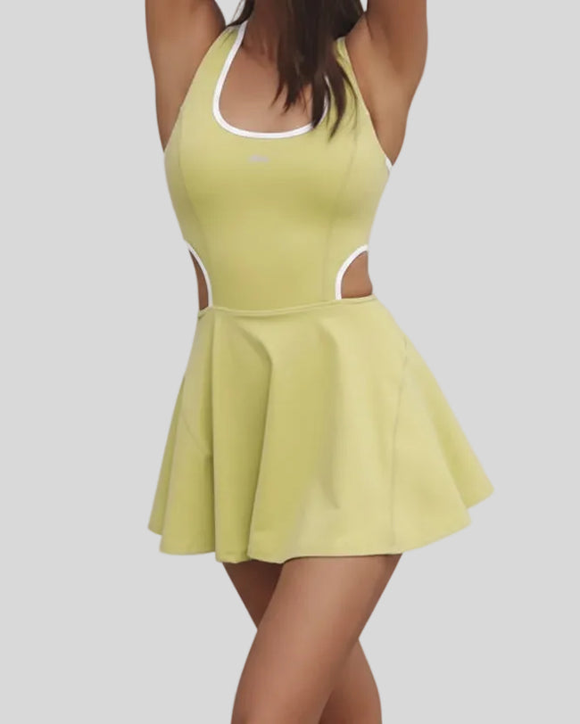 Wide-strap active dress with built-in liner shown from the front in yellow green