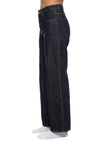 Model wearing DenimEase Straight-Leg Jeans in Navy Blue side view