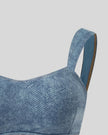 Close-up of front neckline and denim texture of DenimForm Sculpt Bra