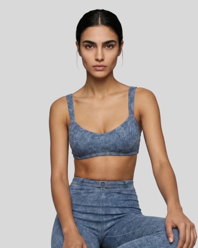 Model wearing DenimForm Sculpt Bra styled with neutral leggings