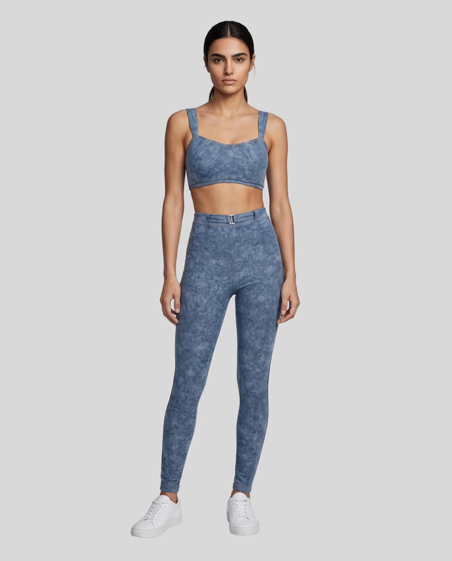 Full body view of model wearing DenimForm Sculpt Legging with matching sports bra in Light Blue