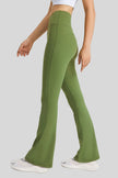 Effortless movement of EarthFlow Flare Yoga Pant in Green - Athlesi
