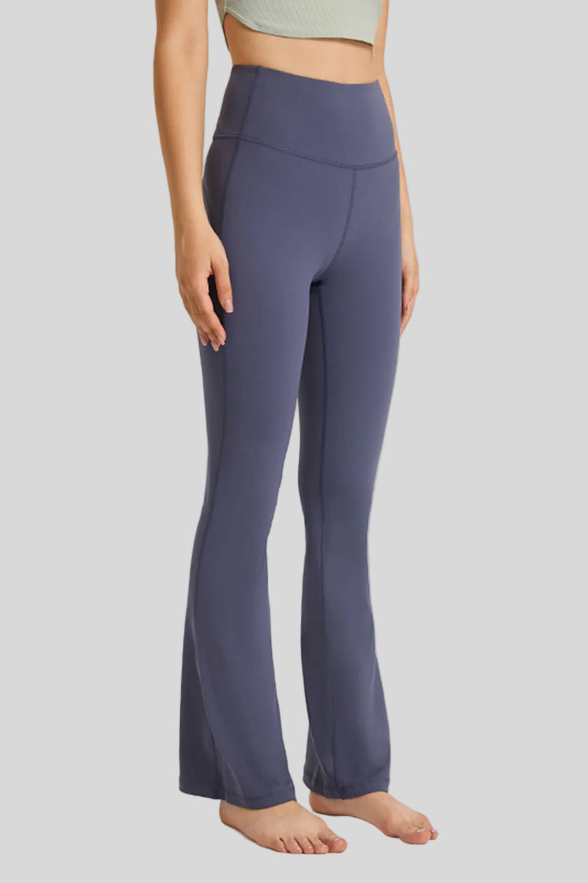 Effortless movement of EarthFlow Flare Yoga Pant in Navy - Athlesi