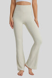 Easy flow and a lengthening effect of EarthFlow Flare Yoga Pant in White - Athlesi