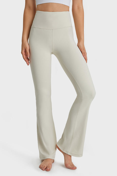 Easy flow and a lengthening effect of EarthFlow Flare Yoga Pant in White - Athlesi