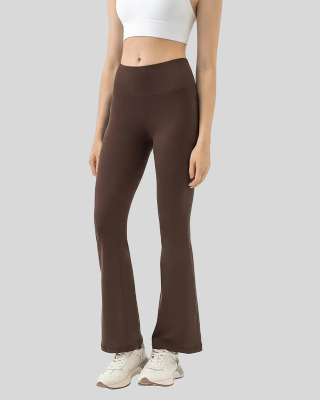 Front angle of EarthFlow Lounge Flare Pant in chocolate showing relaxed flare fit