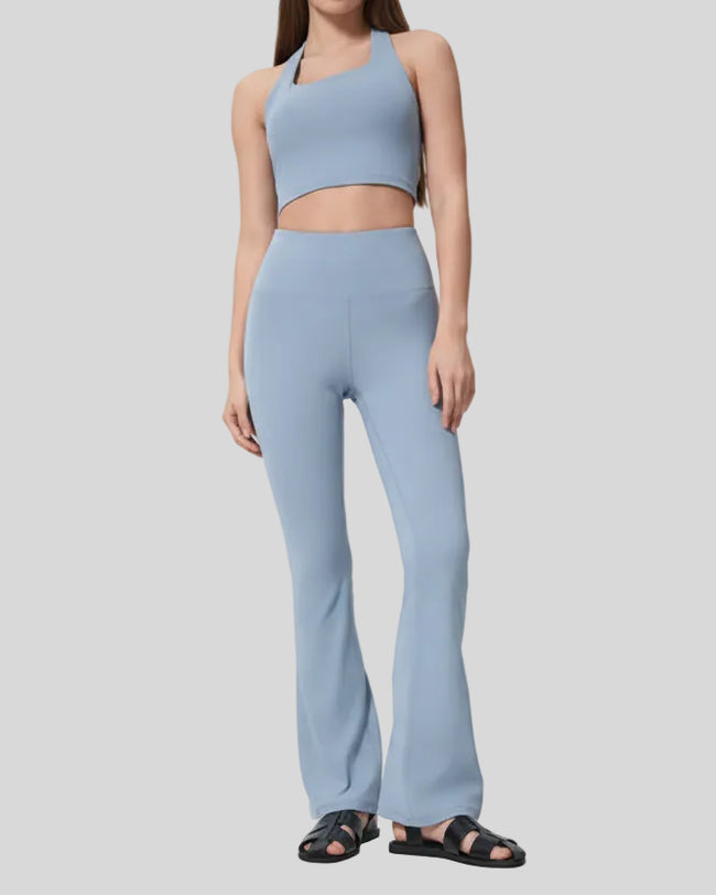 Front angle of EarthFlow Lounge Flare Pant in light blue showing relaxed flare fit