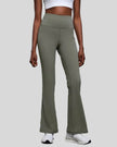 Front side view of EarthFlow Studio Flare Pant in sage showing high-waist fit