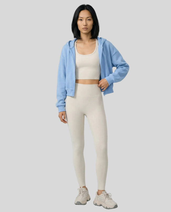 EaseForm Zip Hoodie Jacket in light blue worn by model full body front view styled in a clean studio setting